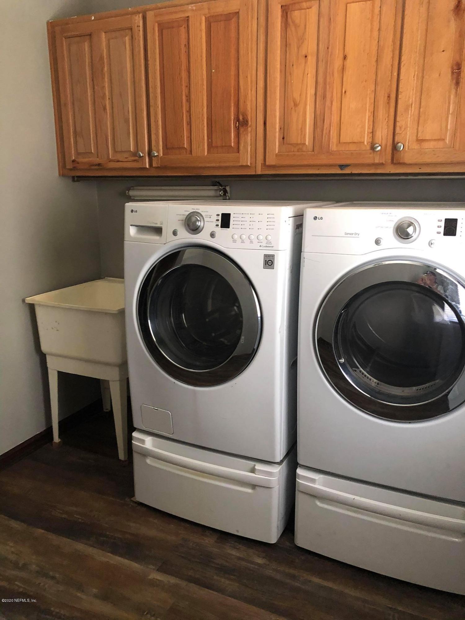 7237 89th Road Live Oak, FL 32060 - Photo 8 of 25 laundry area with sink
