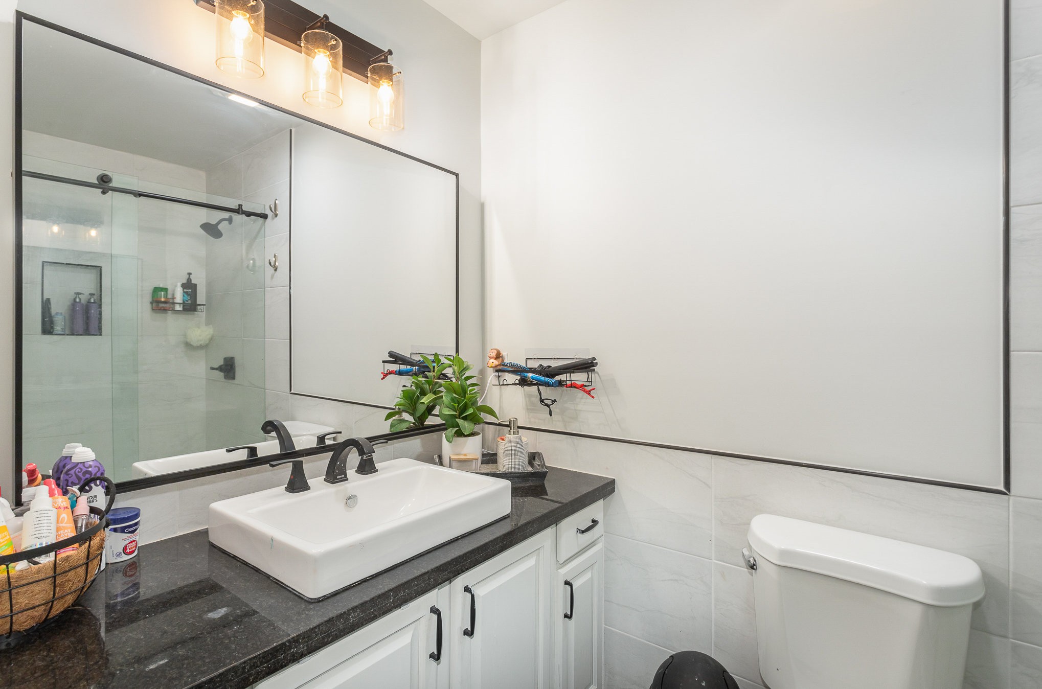 7953 Spot Light Road Lyles, TN 37098 - Photo 12 of 19 a bathroom with a sink toilet and mirror