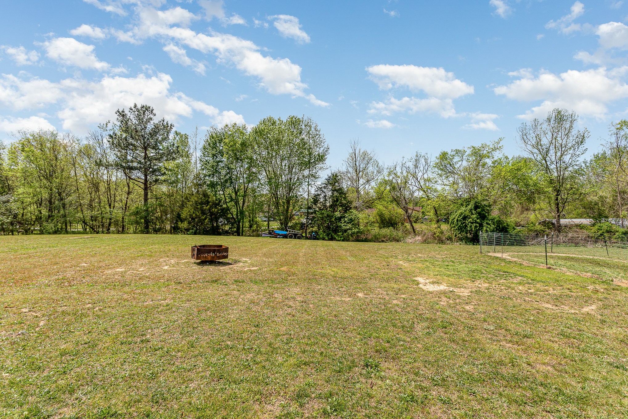 7953 Spot Light Road Lyles, TN 37098 - Photo 14 of 19 a view of a field with trees in the background
