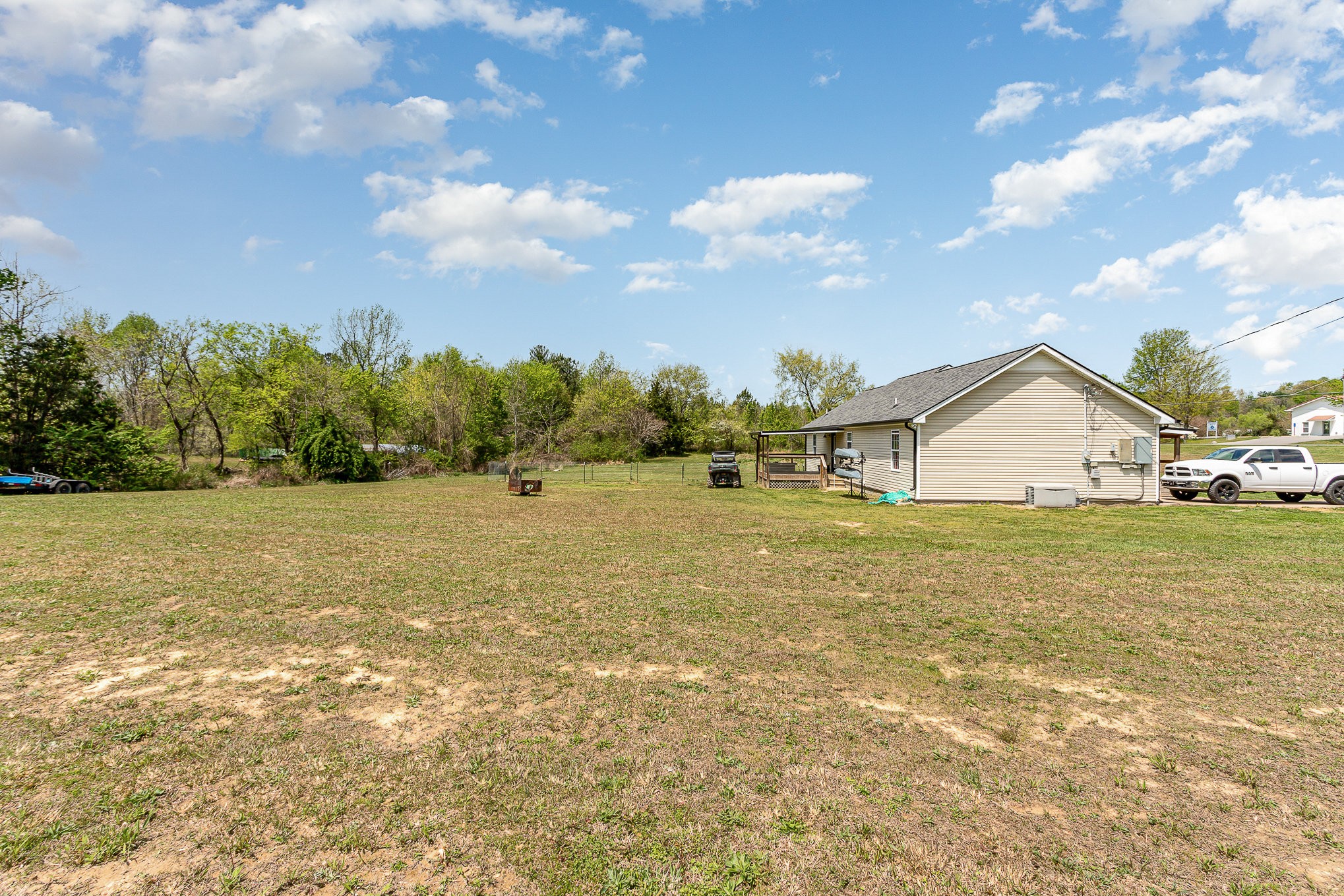 7953 Spot Light Road Lyles, TN 37098 - Photo 16 of 19 a view of a house with a yard