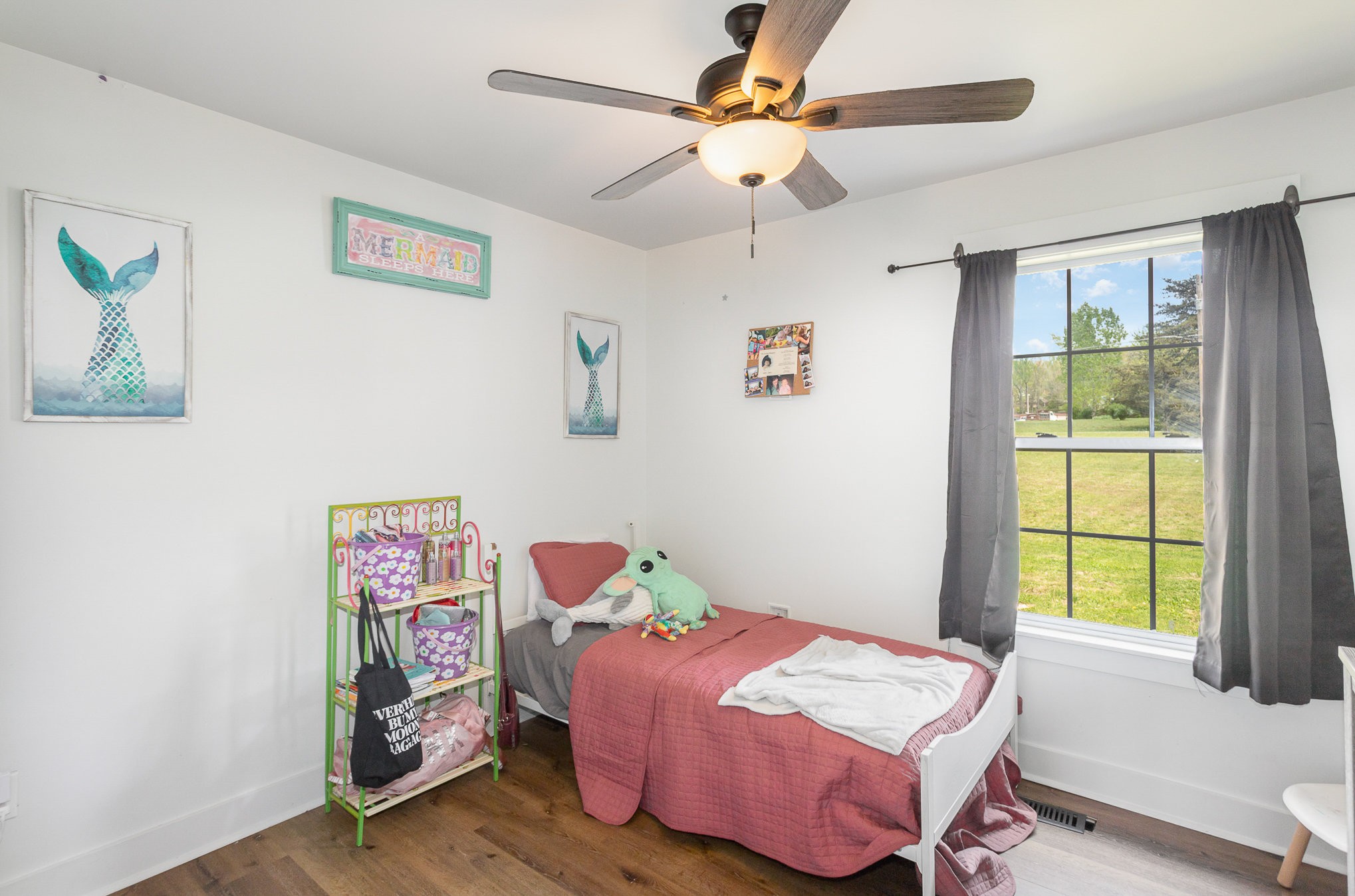 7953 Spot Light Road Lyles, TN 37098 - Photo 18 of 19 a bedroom with a bed and a window