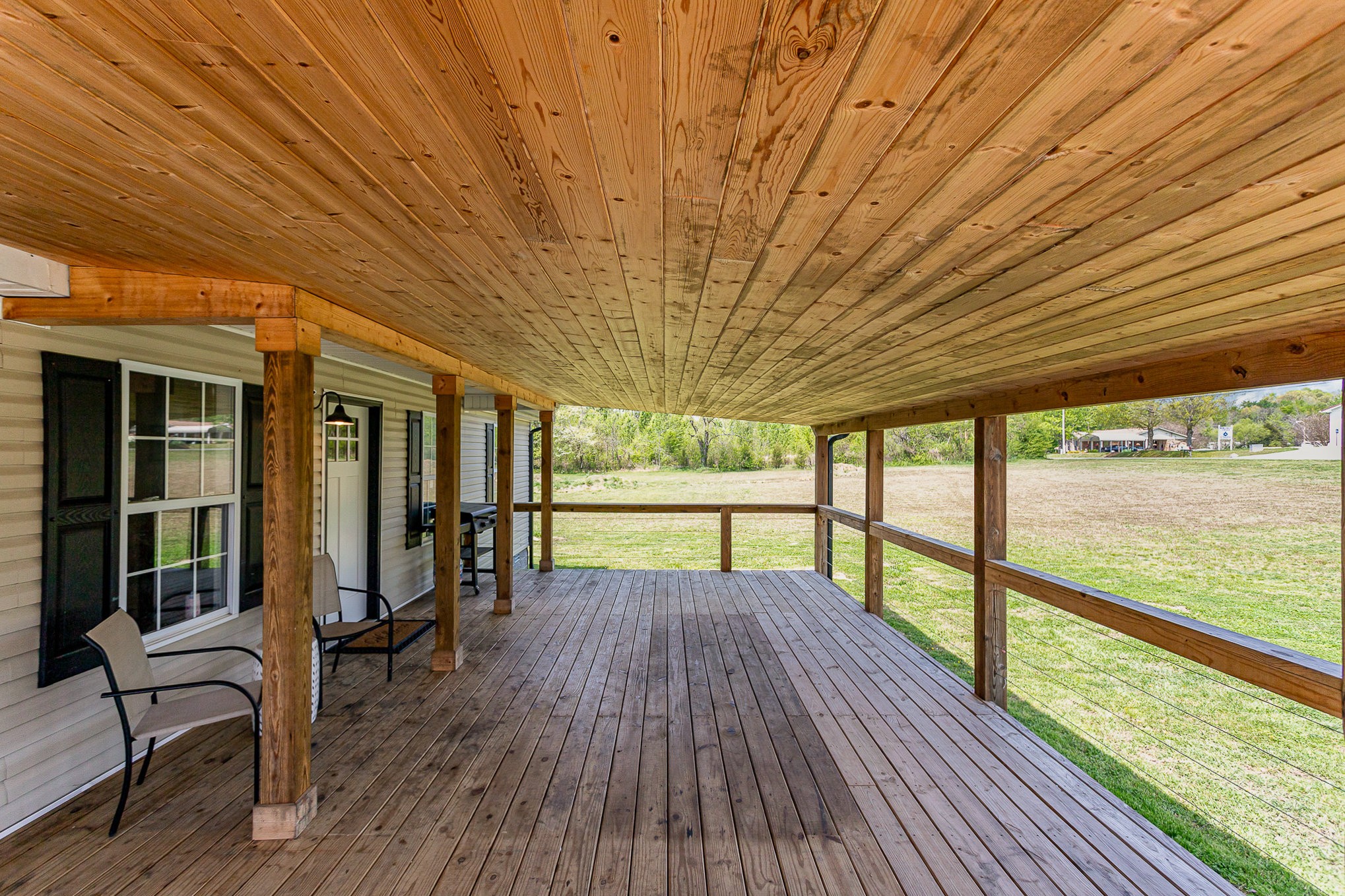 7953 Spot Light Road Lyles, TN 37098 - Photo 4 of 19 a view of two chairs in the balcony