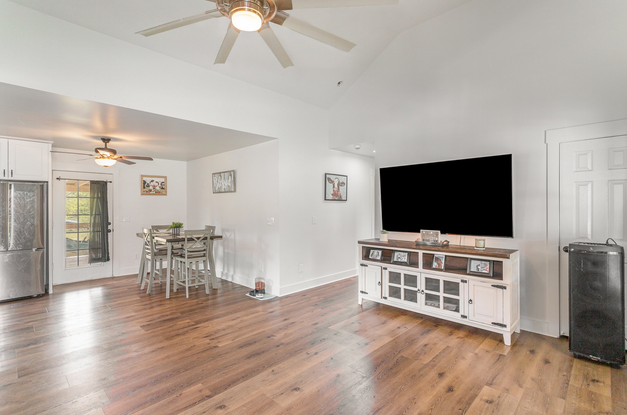 7953 Spot Light Road Lyles, TN 37098 - Photo 6 of 19 a living room with furniture and a flat screen tv
