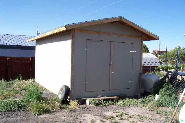 1163 Dale Street Eagar, AZ 85925 - Photo 3 of 5 a backyard of a house with potted plants