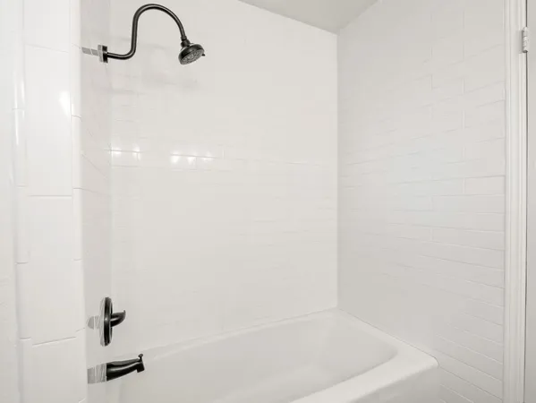 a close view of a bathtub in bathroom