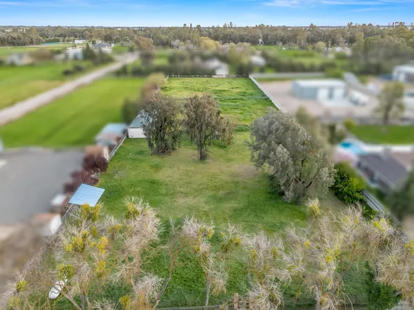 a view of lake with green space