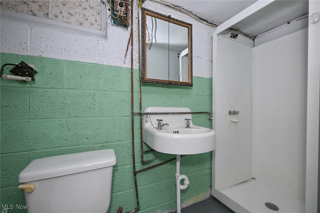 4033 Wyncote Road South Euclid, OH 44121 - Photo 21 of 25 Bathroom with toilet, walk in shower, and sink