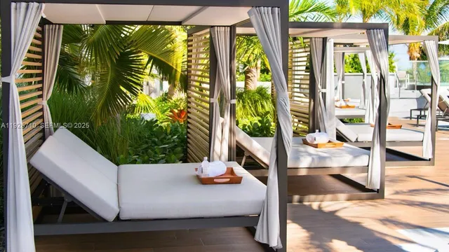 a view of swimming pool from a balcony