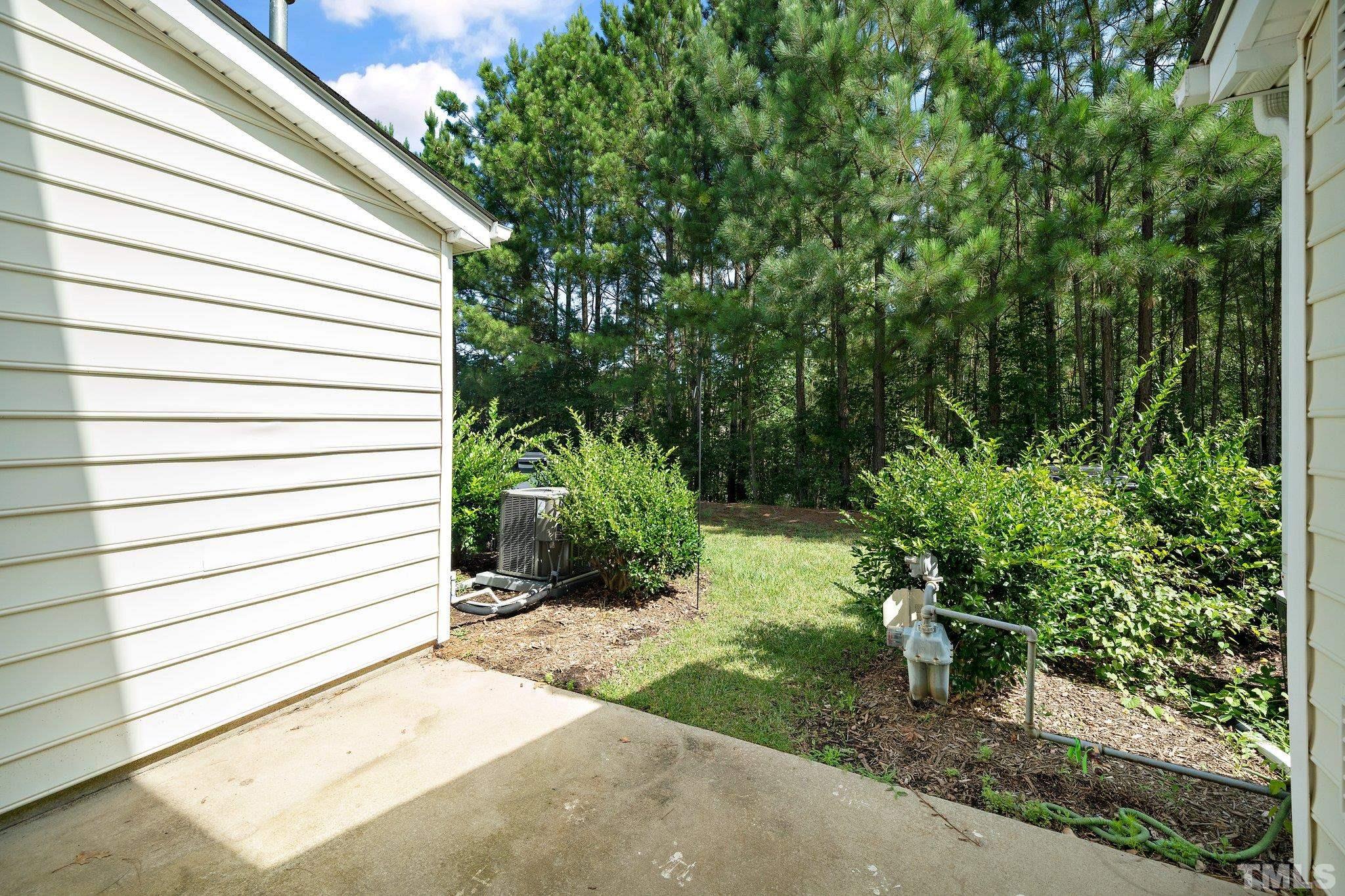 4114 Brenmar Lane Durham, NC 27713 - Photo 13 of 13 a view of a back yard of a house
