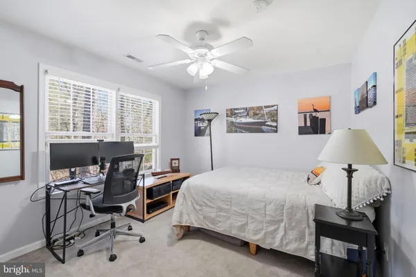 a bedroom with furniture and a couch