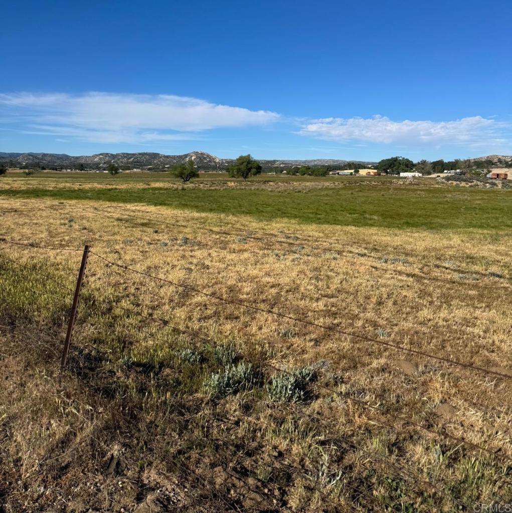 9 Campo Road Dulzura, CA 91917 - Photo 2 of 13 a view of an ocean and sunset