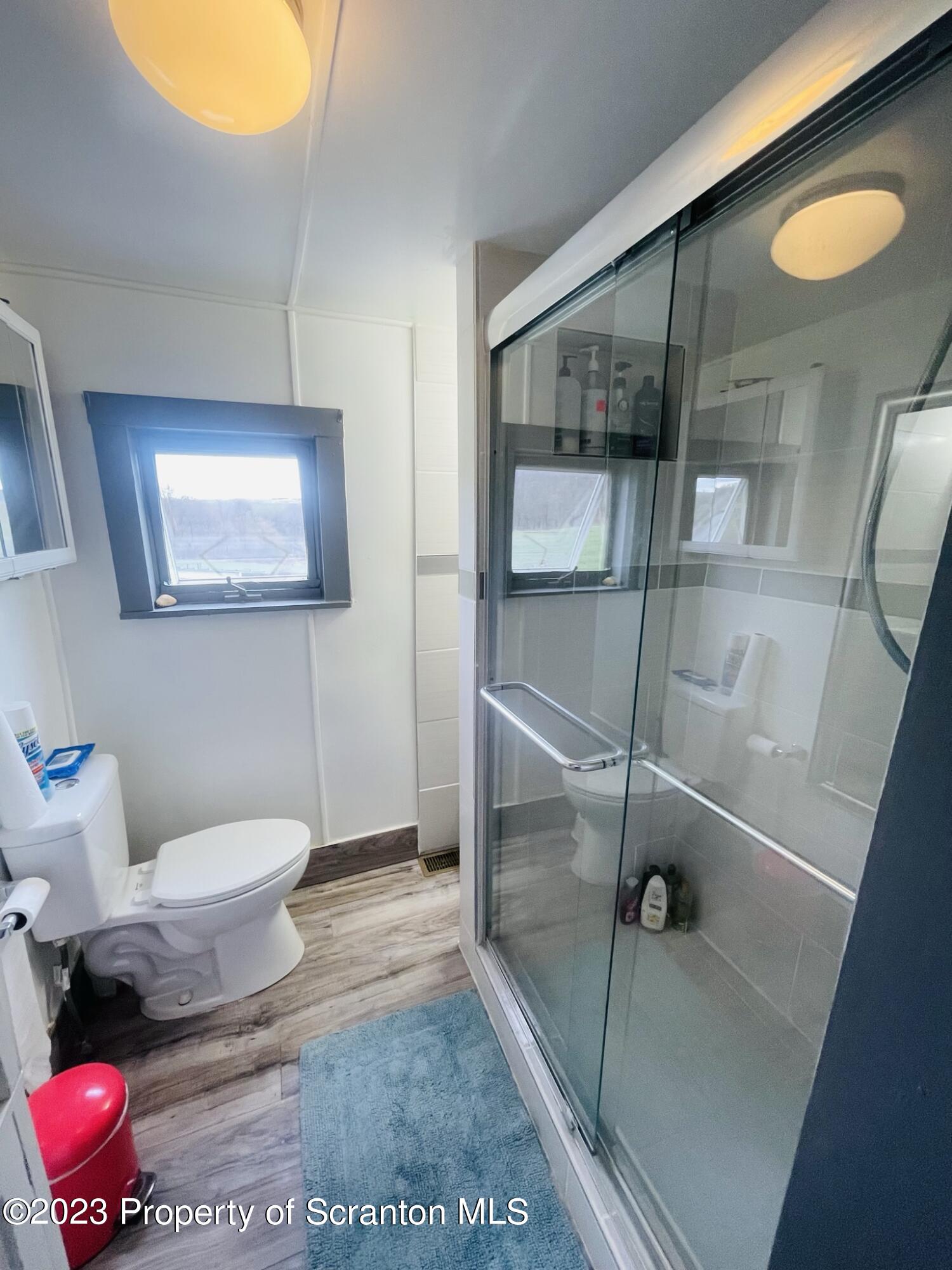 176 Stack Road Thompson, PA 18465 - Photo 12 of 53 a bathroom with a toilet