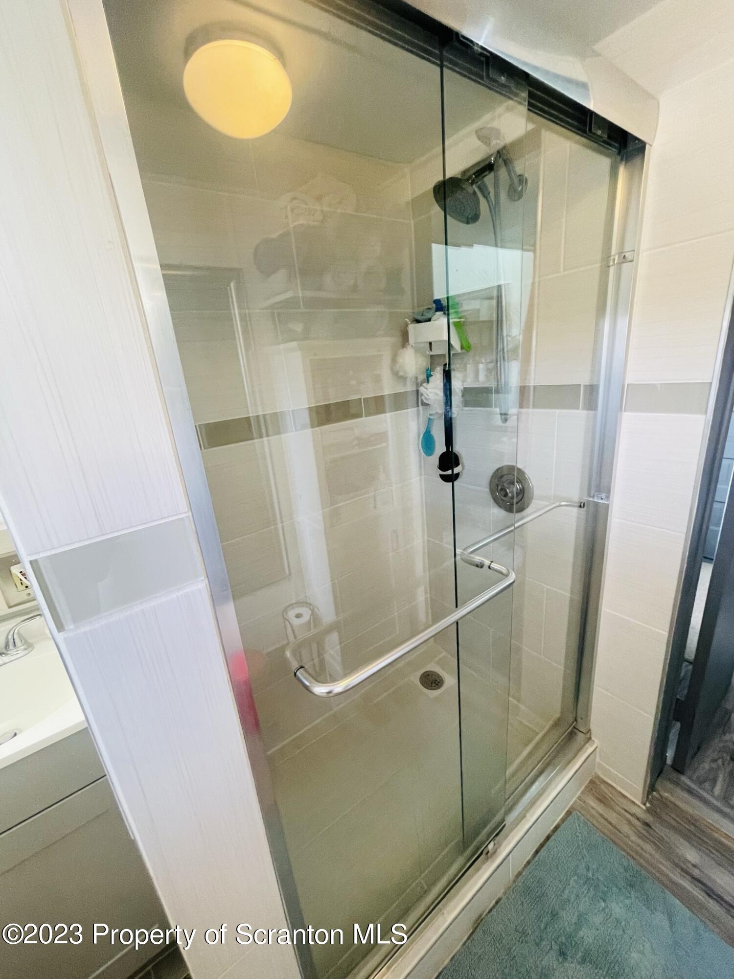 176 Stack Road Thompson, PA 18465 - Photo 15 of 53 a bathroom with a shower