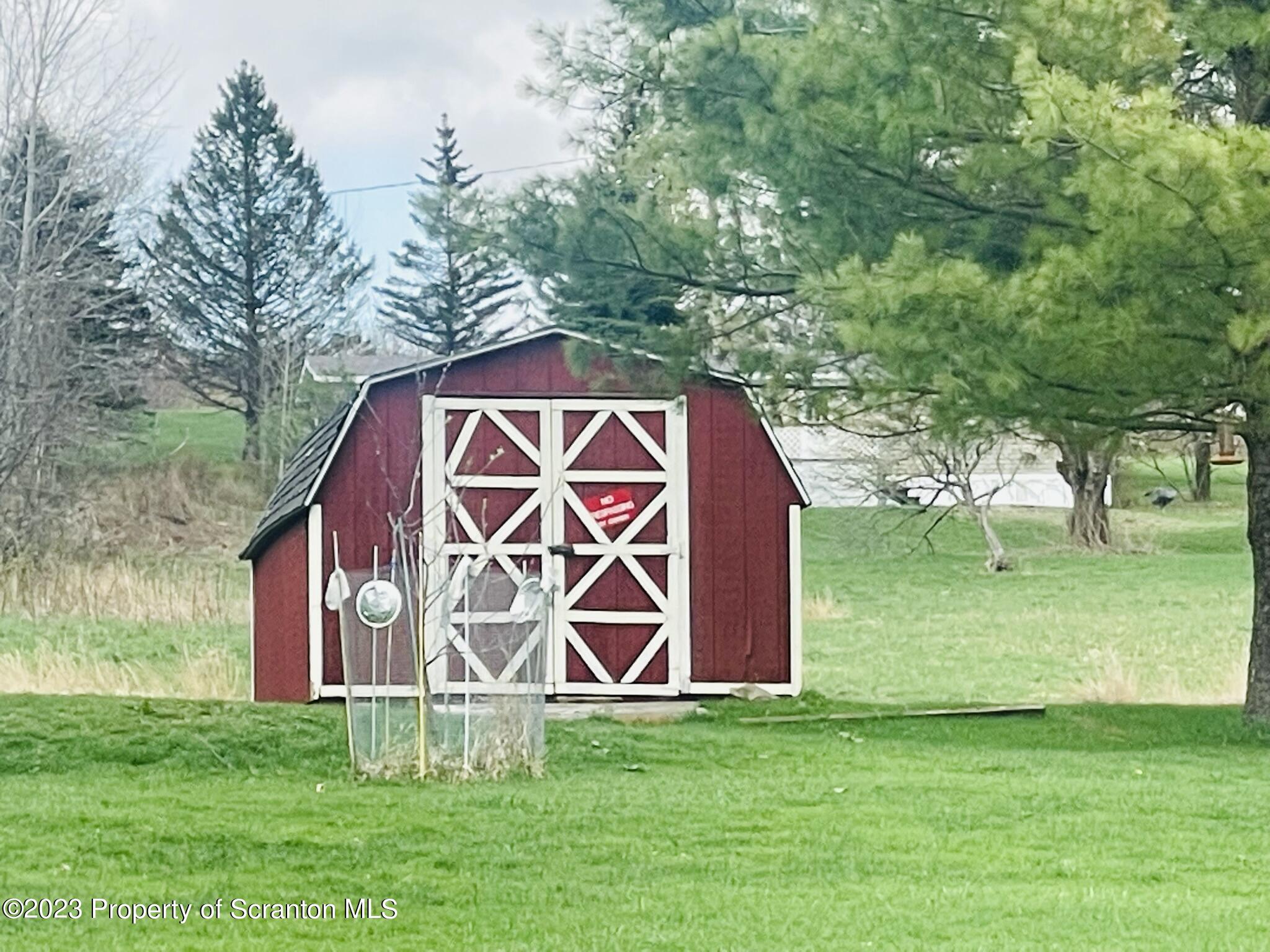 176 Stack Road Thompson, PA 18465 - Photo 39 of 53 a view of backyard with green space
