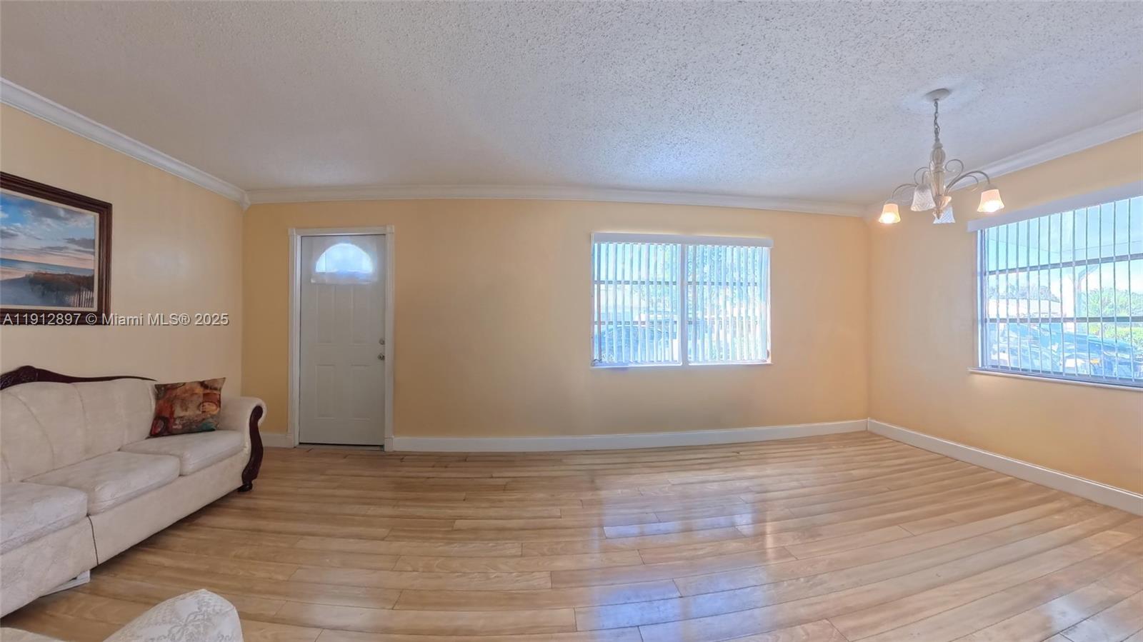 10 Dawn Flower Circle Lehigh Acres, FL 33936 - Photo 15 of 25 a view of livingroom with furniture and window