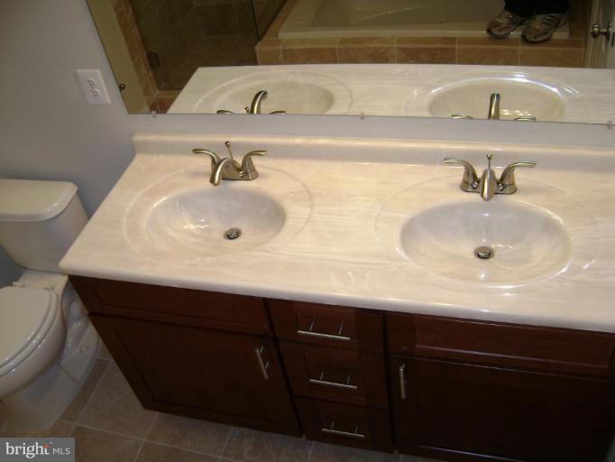 923 10th Street Northeast Washington, DC 20002 - Photo 4 of 20 His and her sink in the master bathroom