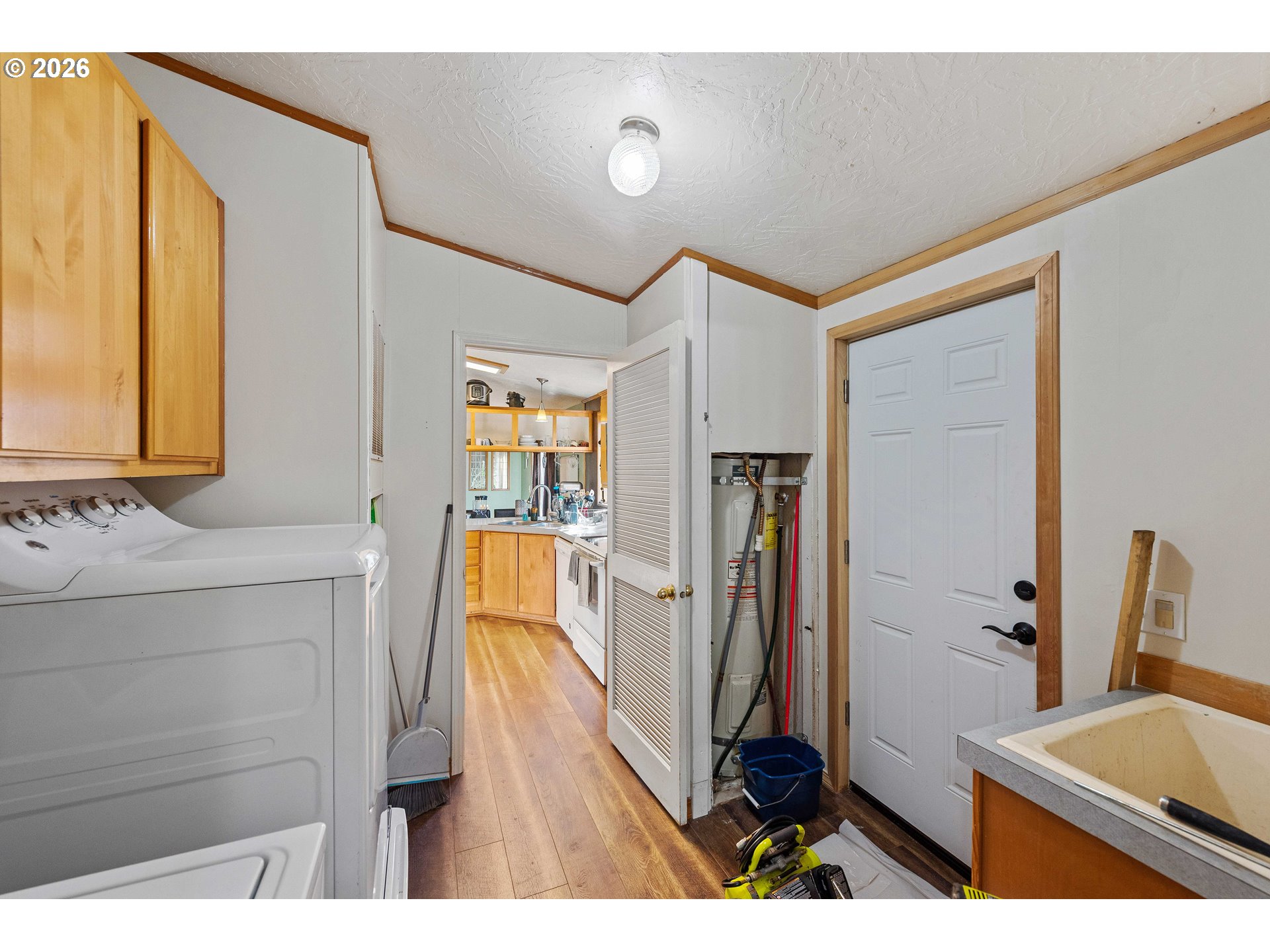 41308 South Powers Road Powers, OR 97466 - Photo 18 of 42 a bathroom with a sink a mirror and a bathtub