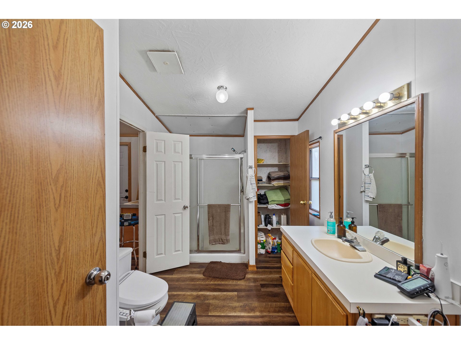 41308 South Powers Road Powers, OR 97466 - Photo 21 of 42 a bathroom with a sink a toilet and shower