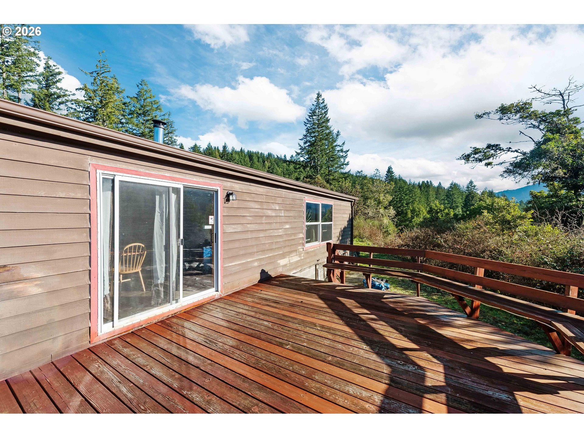 41308 South Powers Road Powers, OR 97466 - Photo 24 of 42 a view of balcony with wooden floor and fence