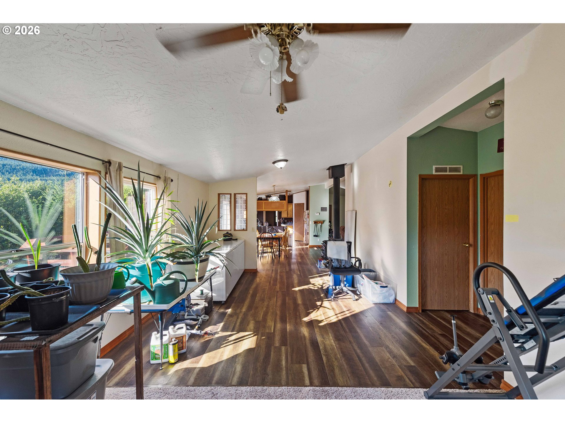 41308 South Powers Road Powers, OR 97466 - Photo 42 of 42 a living room with furniture and a flat screen tv