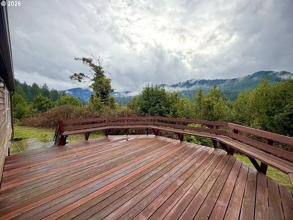 a view of deck with wooden floor and outdoor seating