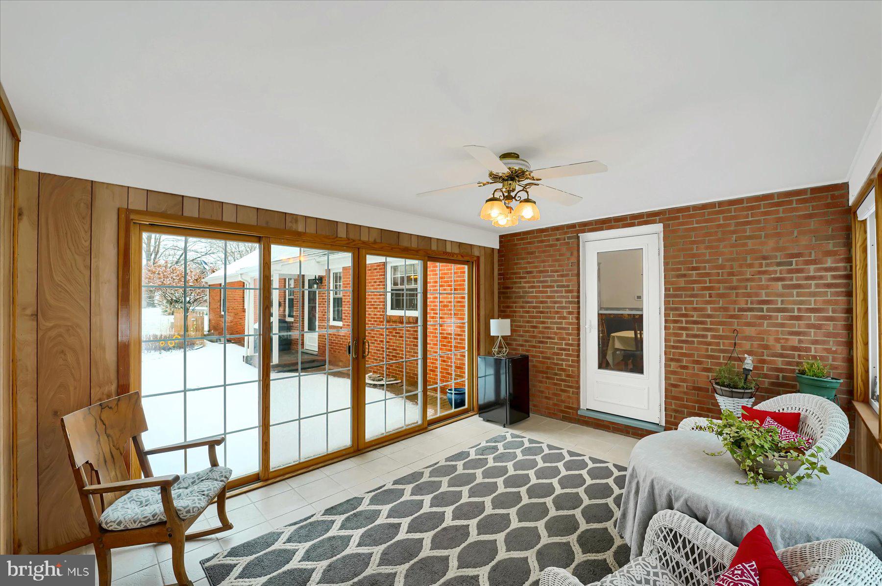 1105 Outer Drive State College, PA 16801 - Photo 27 of 44 a bedroom with a bed and a chandelier