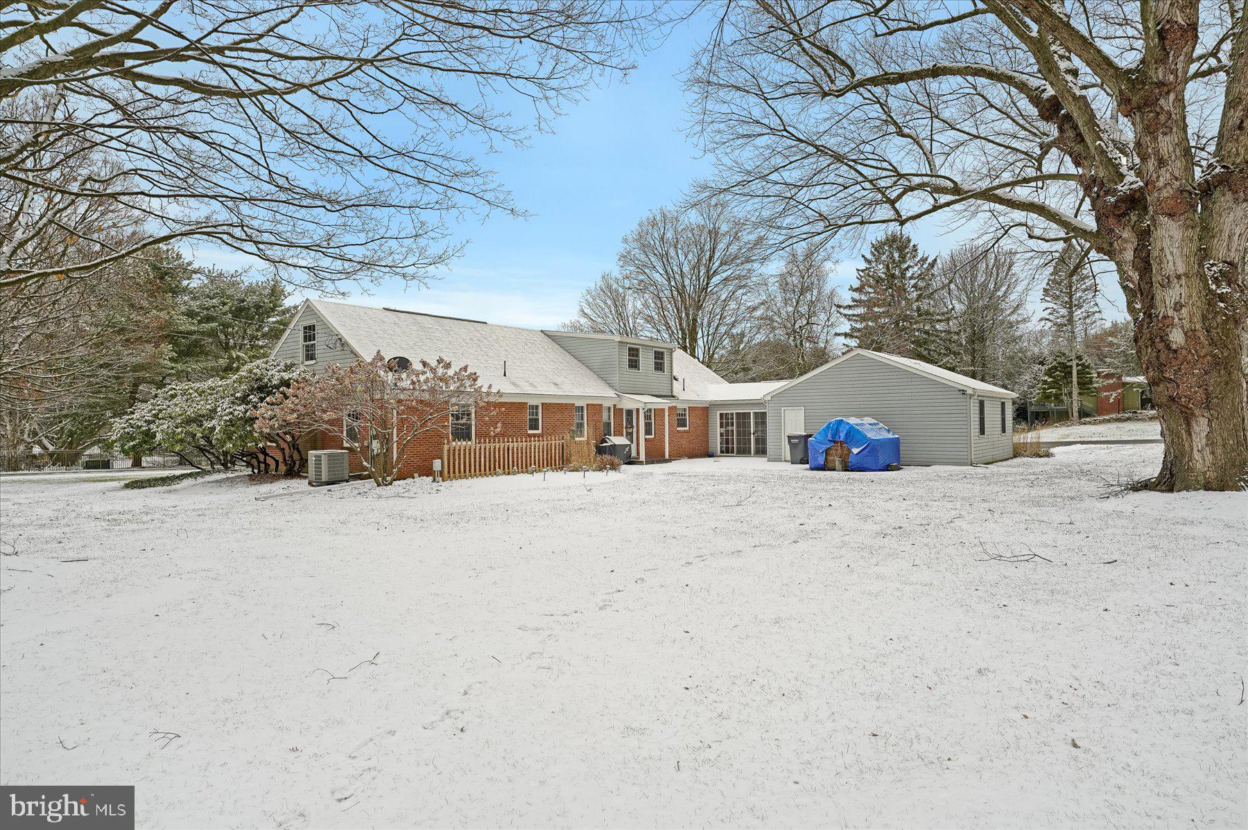 1105 Outer Drive State College, PA 16801 - Photo 34 of 44 a front view of house with large trees