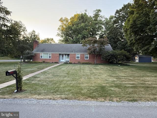 1105 Outer Drive State College, PA 16801 - Photo 40 of 44 a front view of a house with a yard