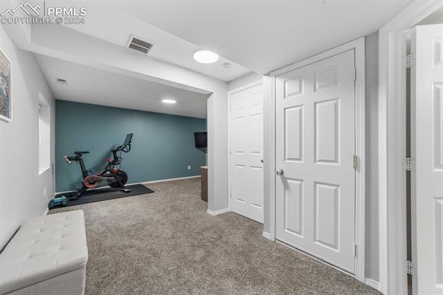 6525 Bismark Road Colorado Springs, CO 80922 - Photo 14 of 38 Workout area with carpet flooring