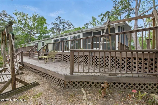 a view of a patio with a yard