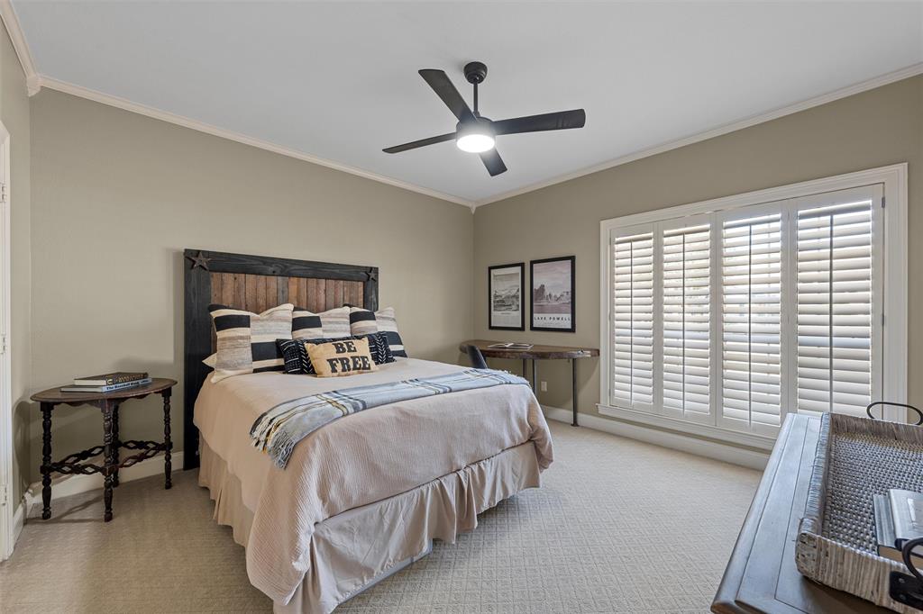 2030 Rustic Trail Waco, TX 76657 - Photo 21 of 40 a bed room with a bed and a television