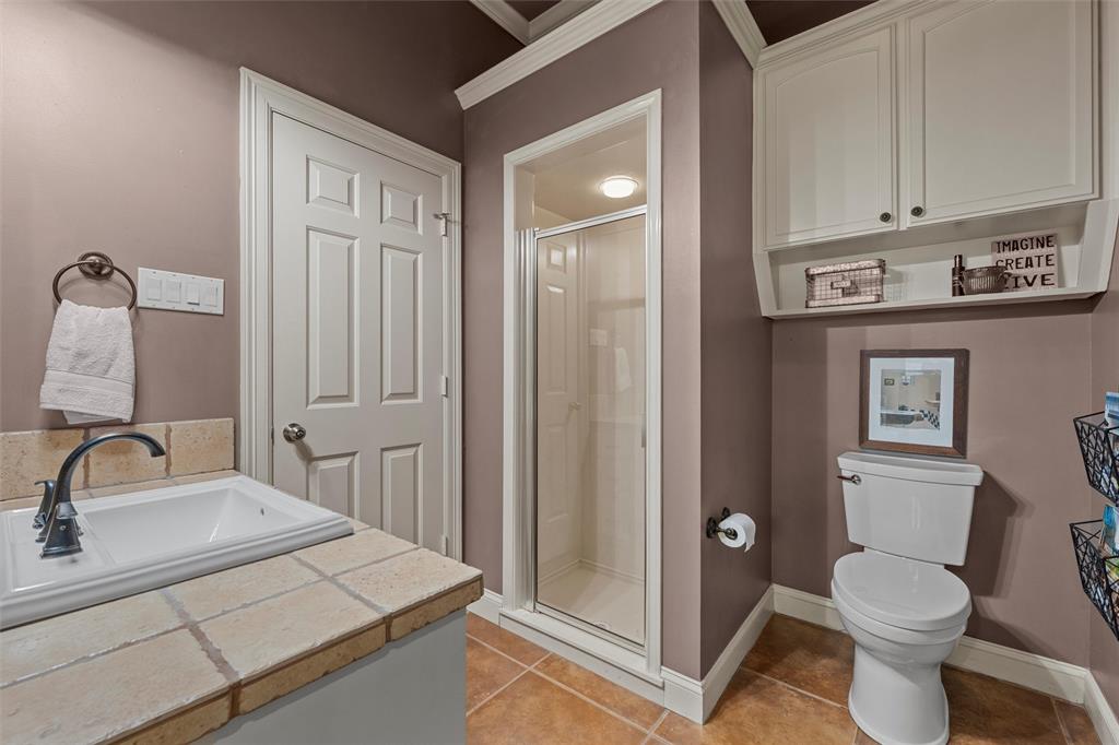 2030 Rustic Trail Waco, TX 76657 - Photo 23 of 40 a bathroom with a sink a toilet and vanity