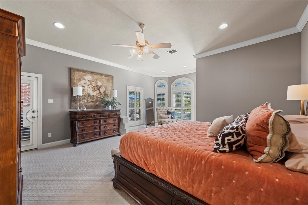 2030 Rustic Trail Waco, TX 76657 - Photo 30 of 40 a bedroom with a bed and dresser with mirror