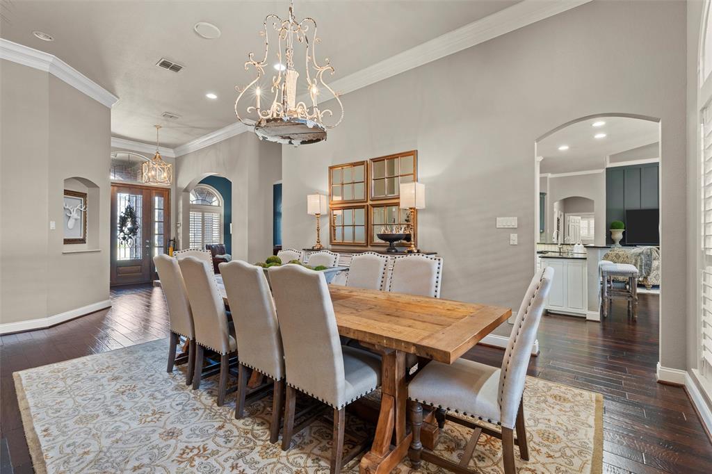 2030 Rustic Trail Waco, TX 76657 - Photo 7 of 40 a view of a dining room with furniture and wooden floor