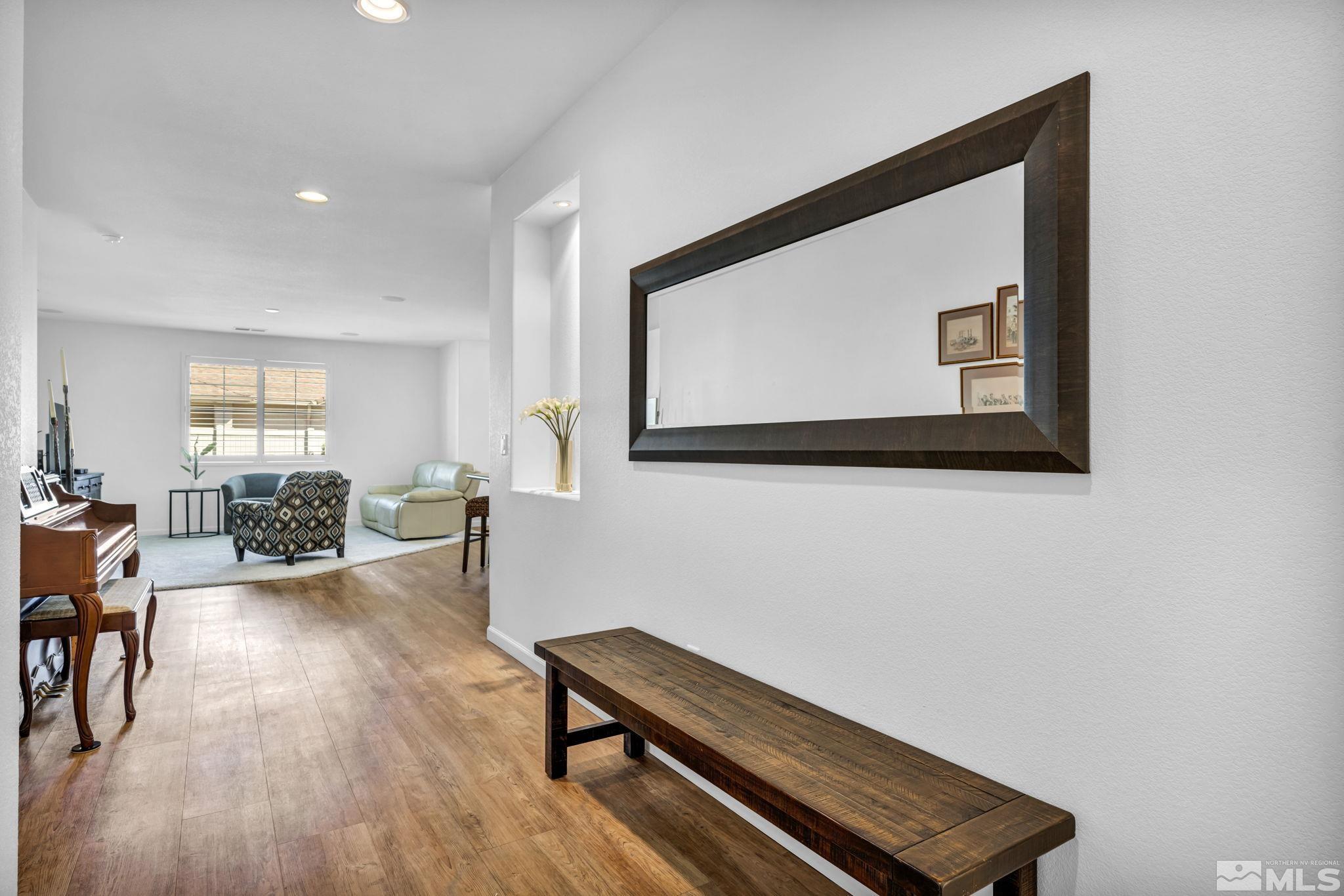 2197 Berkich Court Reno, NV 89521 - Photo 17 of 40 a living room with furniture and a wooden floor