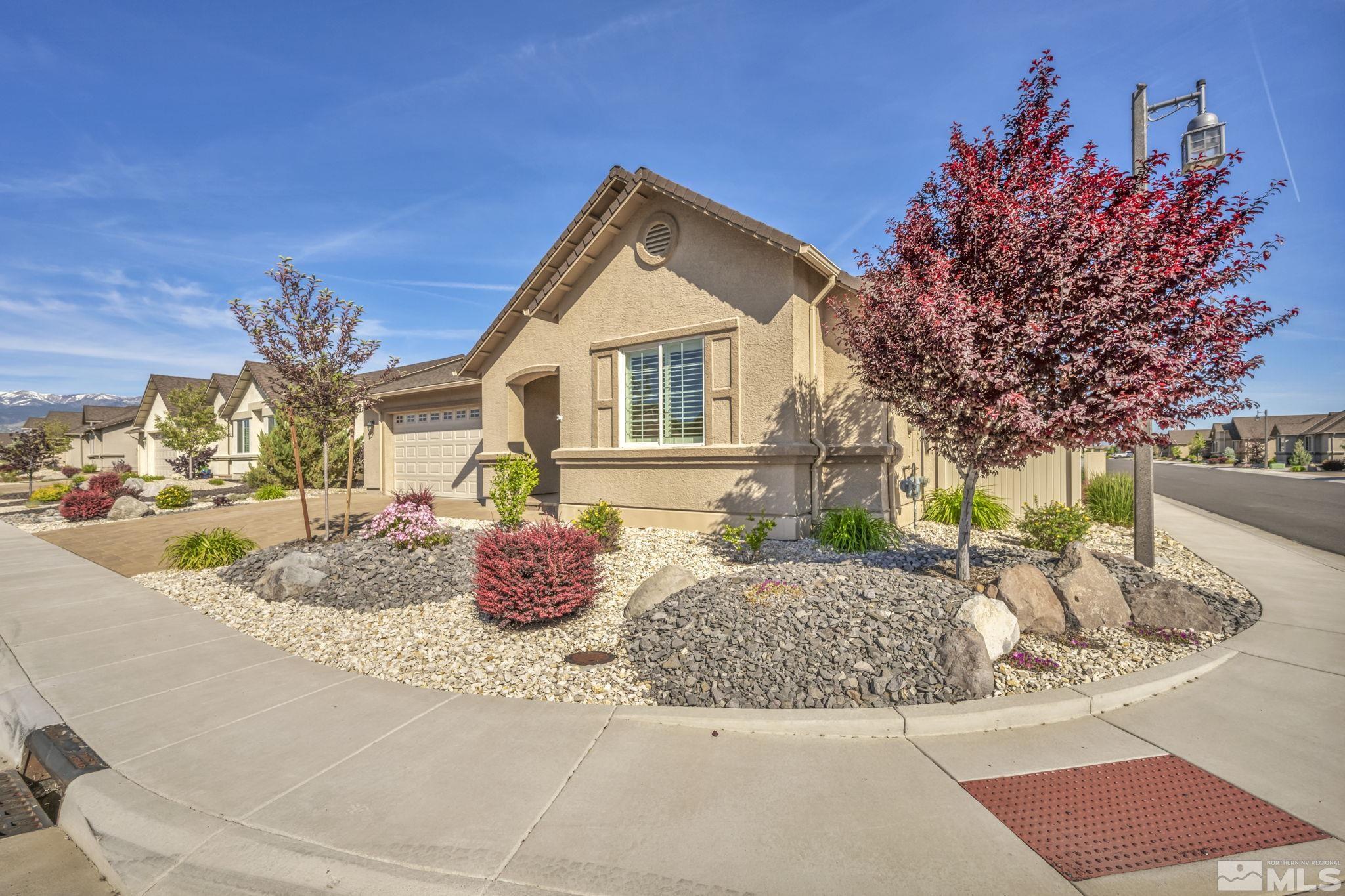 2197 Berkich Court Reno, NV 89521 - Photo 2 of 40 a front view of a house with a porch