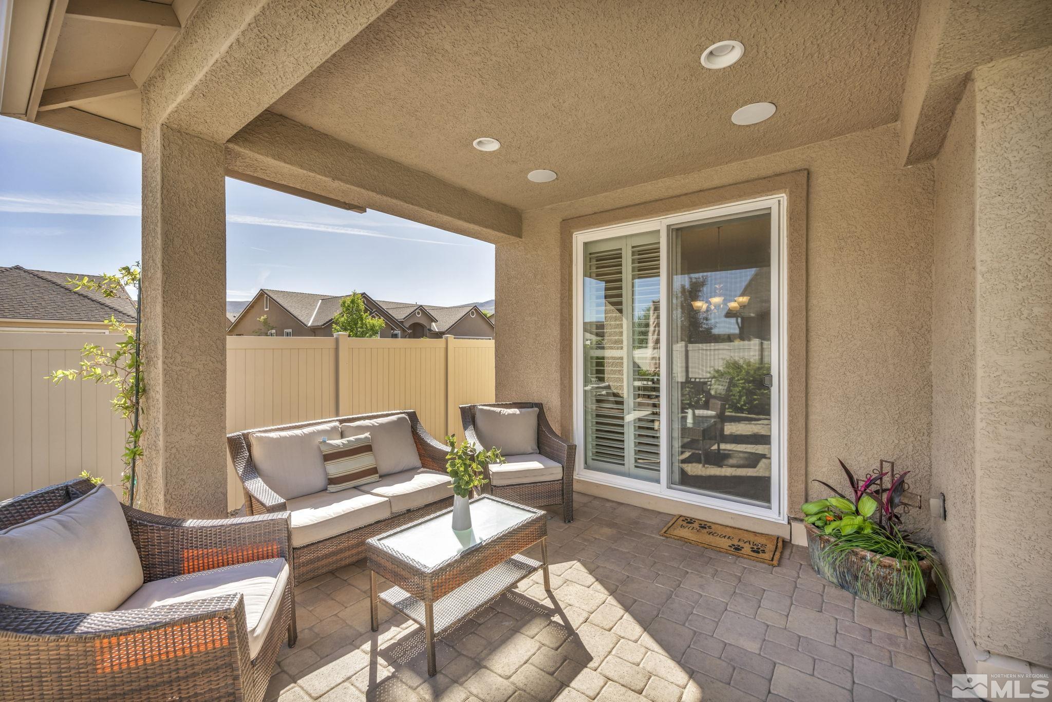 2197 Berkich Court Reno, NV 89521 - Photo 29 of 40 a living room with furniture and a potted plant