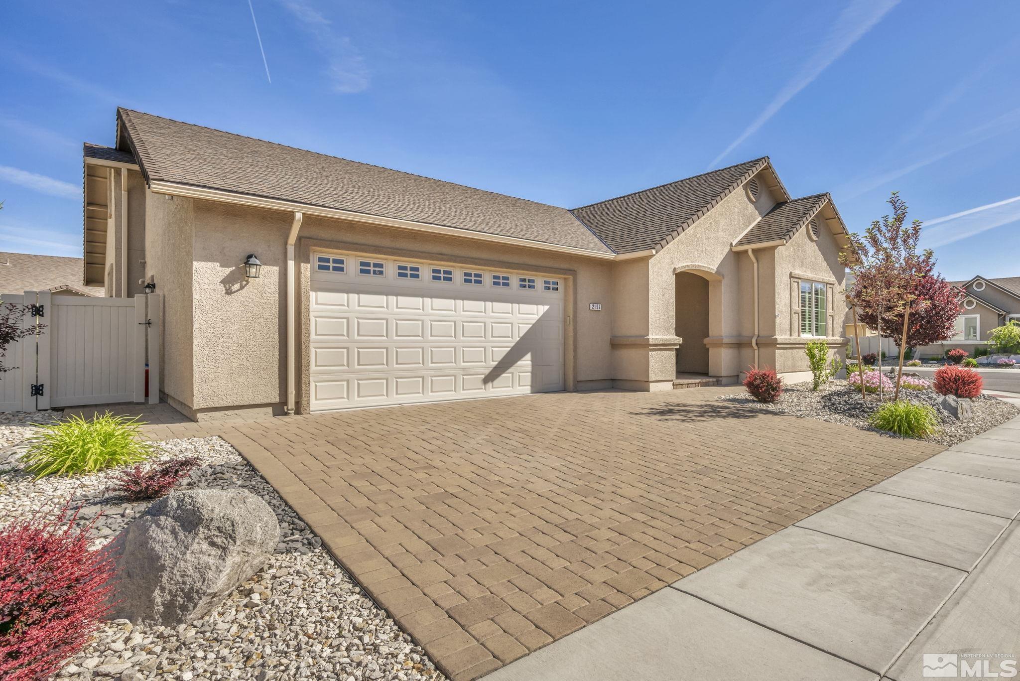 2197 Berkich Court Reno, NV 89521 - Photo 38 of 40 a front view of a house with a yard