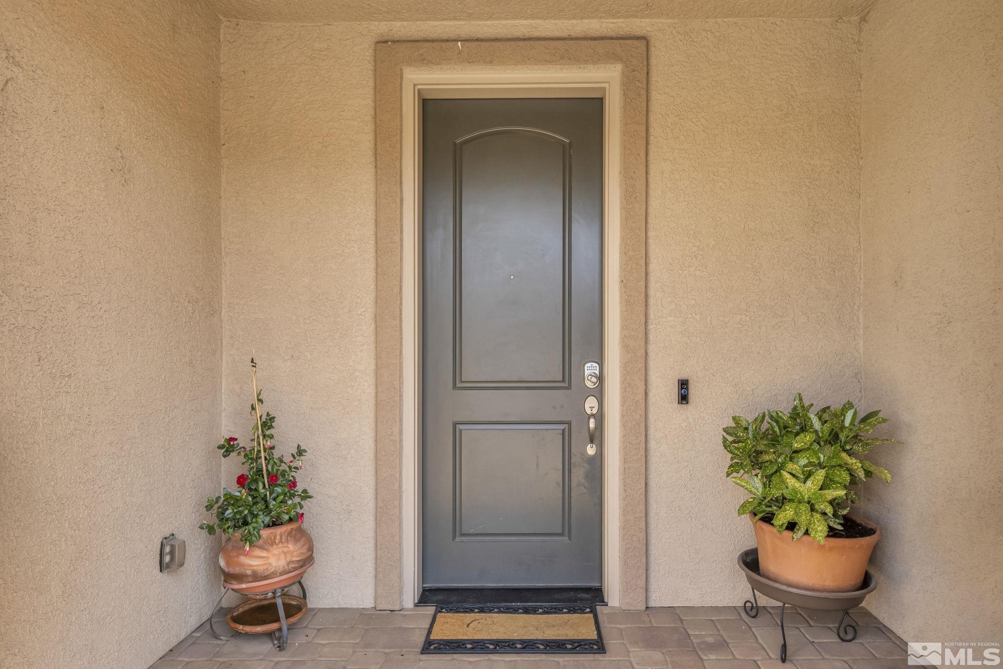 2197 Berkich Court Reno, NV 89521 - Photo 39 of 40 a view of a potted plant in front of a door