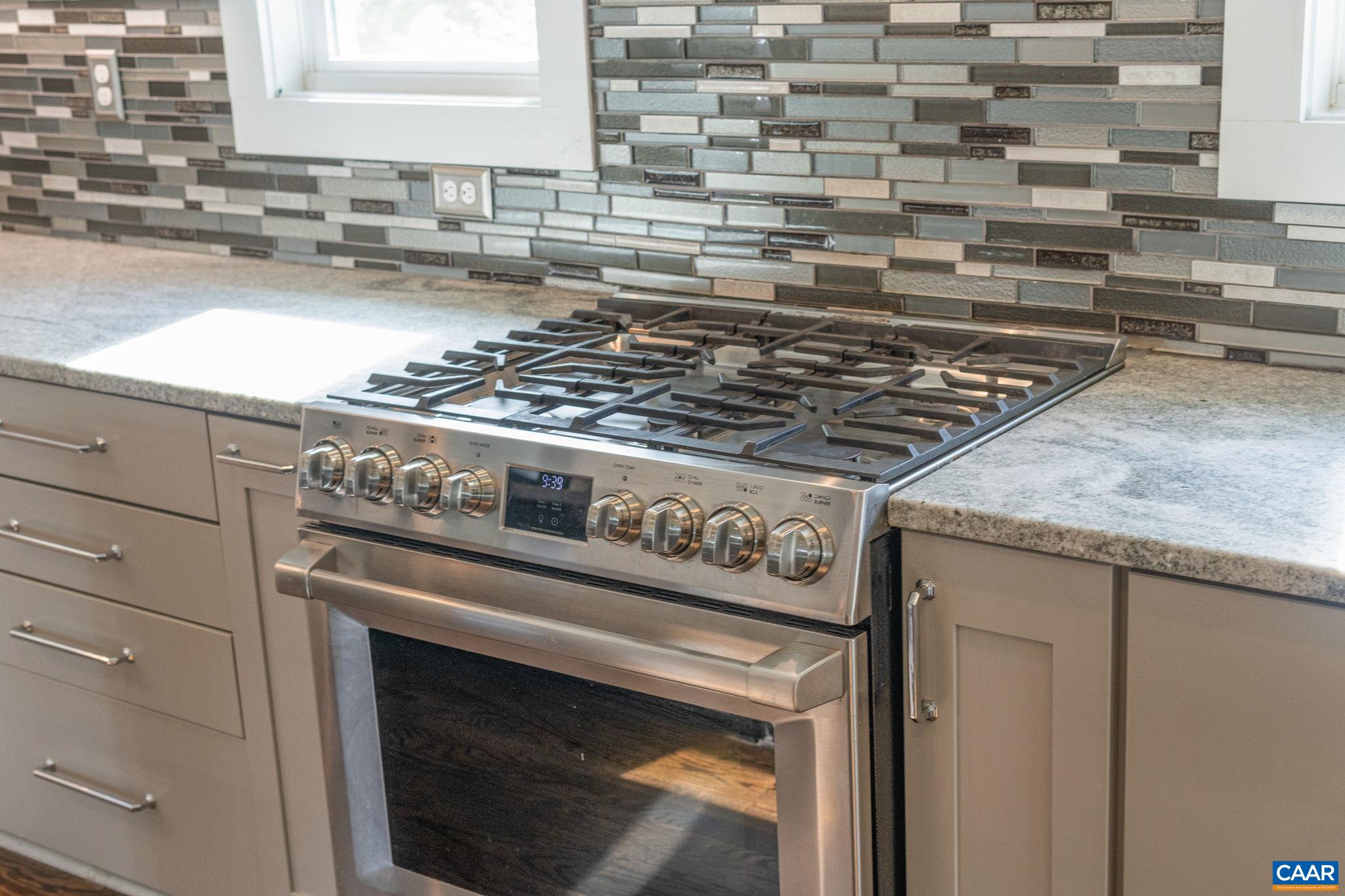5123 Brook View Road Crozet, VA 22932 - Photo 21 of 75 a close view of a stove top oven sitting inside of a kitchen