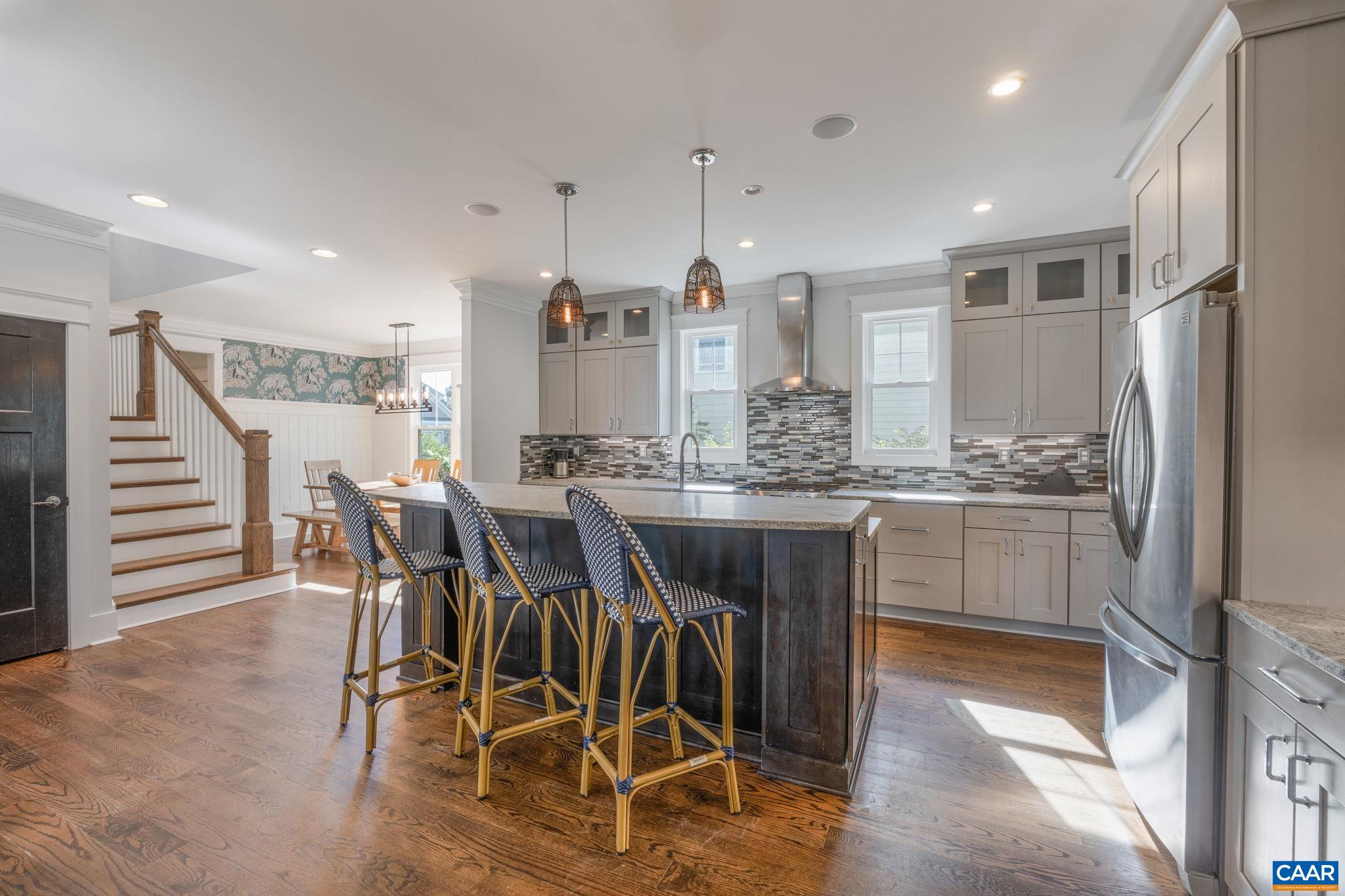5123 Brook View Road Crozet, VA 22932 - Photo 30 of 75 a kitchen with kitchen island granite countertop lots of counter top space and stainless steel appliances