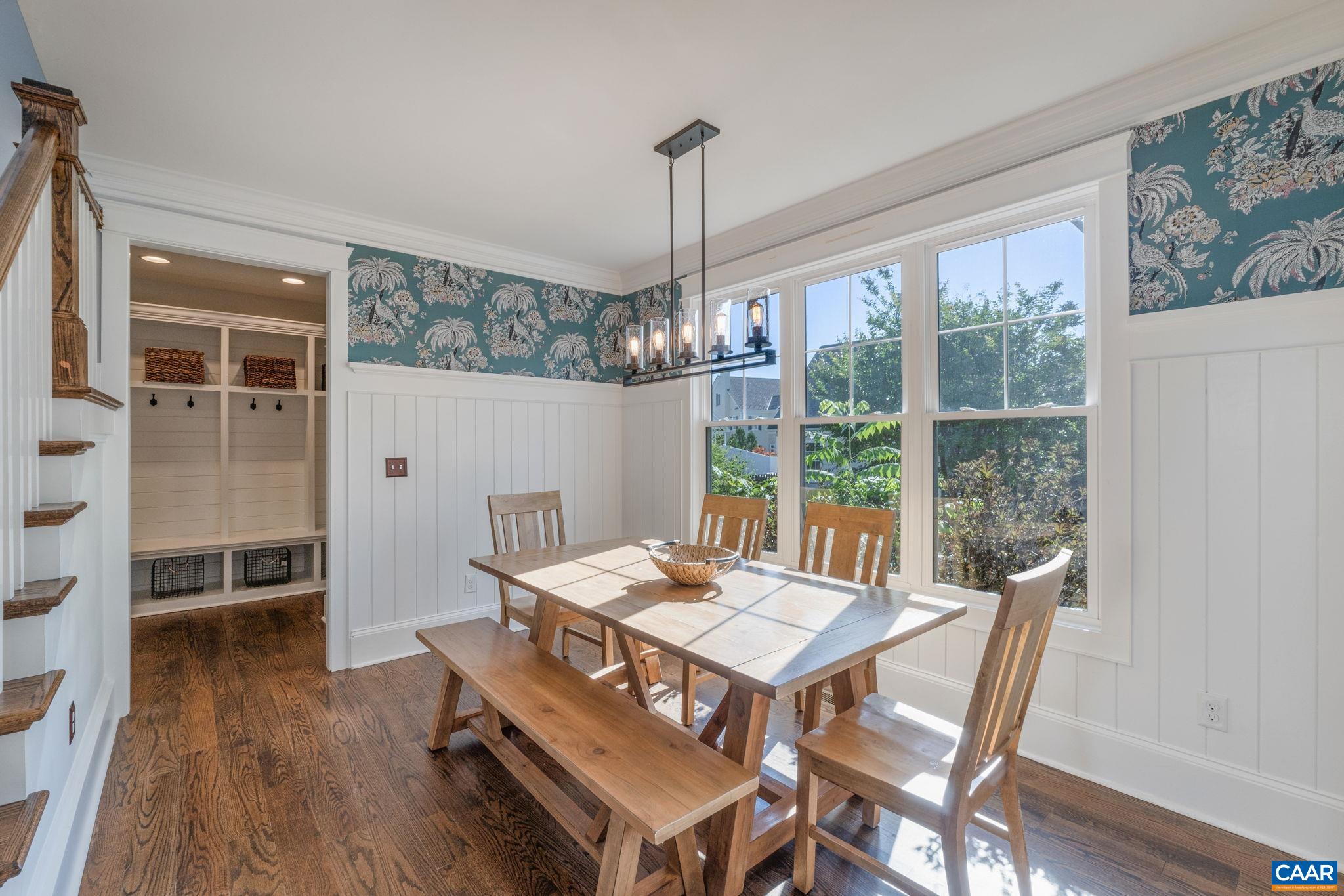 5123 Brook View Road Crozet, VA 22932 - Photo 31 of 75 a view of a dining room with furniture window and wooden floor
