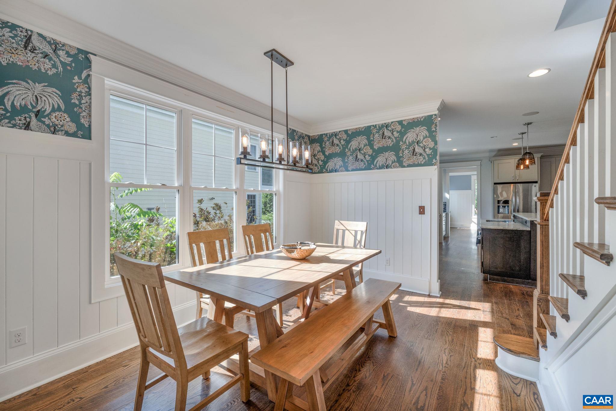 5123 Brook View Road Crozet, VA 22932 - Photo 32 of 75 a view of a dining room with furniture window and wooden floor