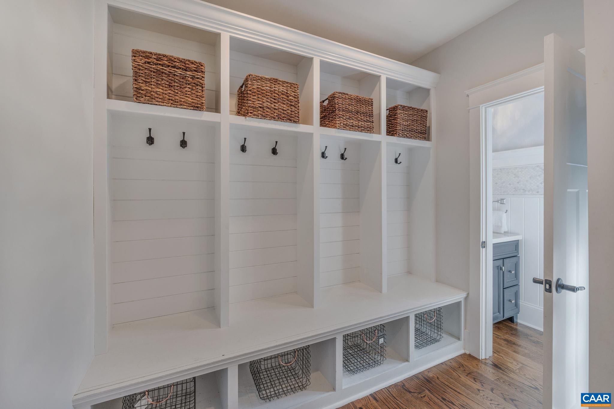 5123 Brook View Road Crozet, VA 22932 - Photo 33 of 75 a view of a hallway with wooden floor and entryway