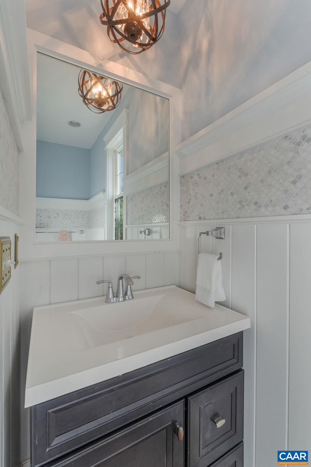 5123 Brook View Road Crozet, VA 22932 - Photo 35 of 75 a bathroom with a sink and a mirror