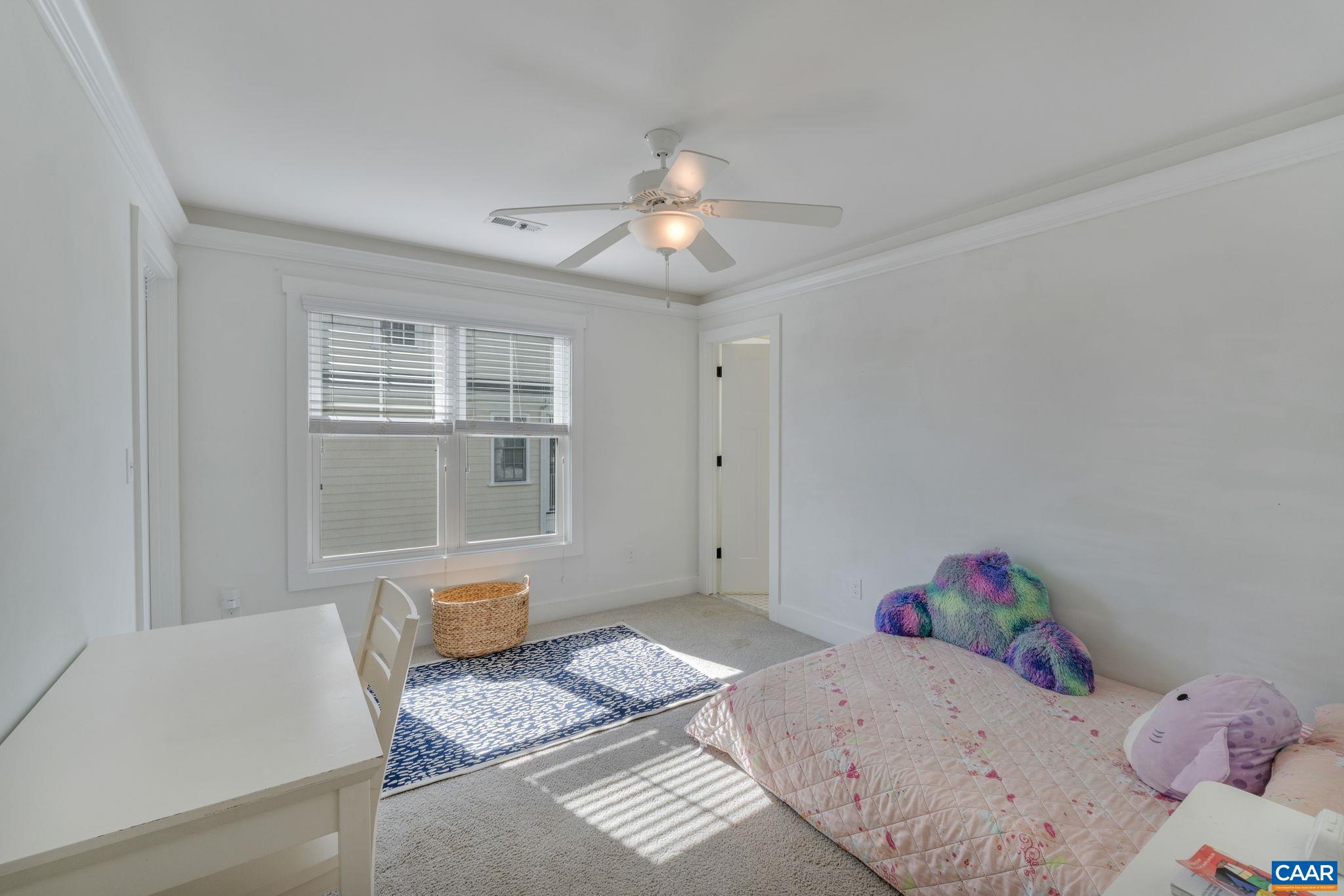 5123 Brook View Road Crozet, VA 22932 - Photo 49 of 75 a bedroom with a bed and wooden floor