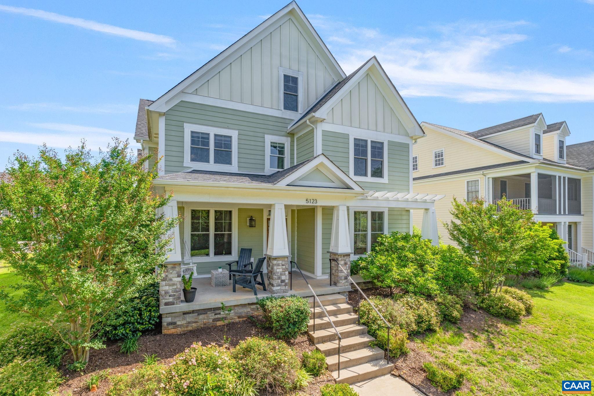 5123 Brook View Road Crozet, VA 22932 - Photo 5 of 75 a front view of a house with yard and green space