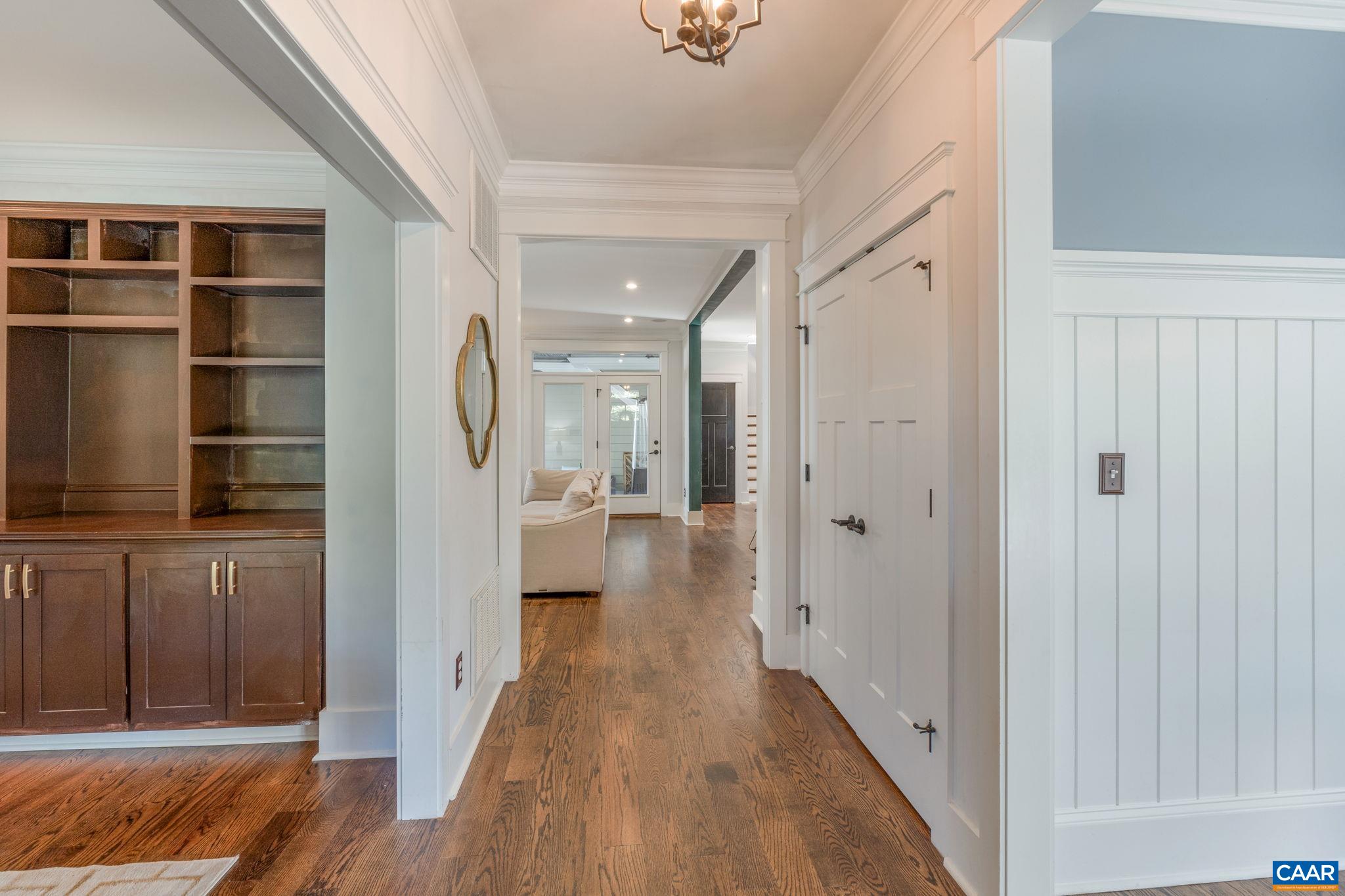 5123 Brook View Road Crozet, VA 22932 - Photo 10 of 75 a view of a hallway with wooden floor and staircase