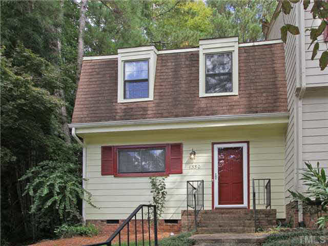 1330 Springlawn Court Raleigh, NC 27609 - Photo 2 of 19 a view of front of a house with a yard
