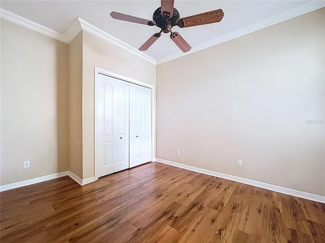 a room with gym equipment and view of living room